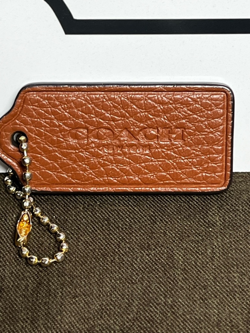 Coach Brown 2.25” Pebbled Leather Hangtag